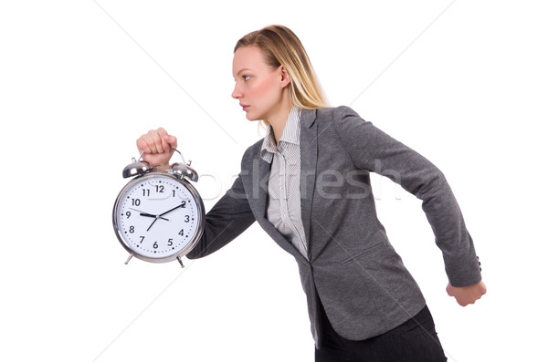 Businesswoman in gray suit holding alarm clock isolated on white Stock photo © Elnur