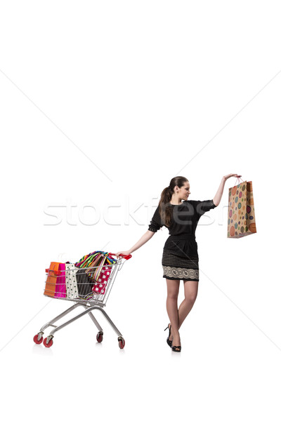Woman with shopping cart and bags isolated on white Stock photo © Elnur