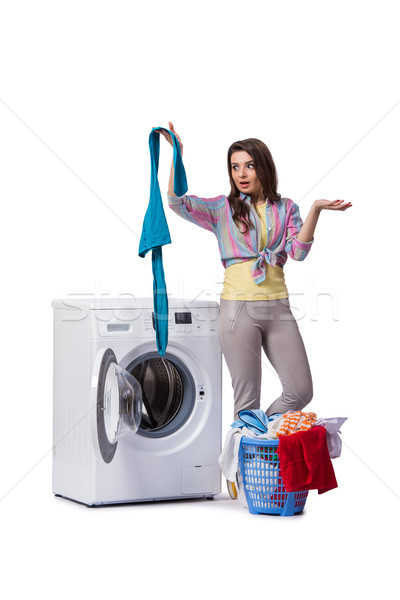 Woman tired after doing laundry isolated on white Stock photo © Elnur