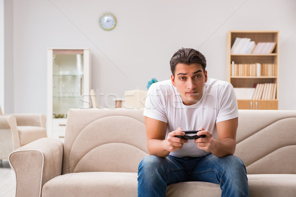 Man addicted to computer games Stock photo © Elnur