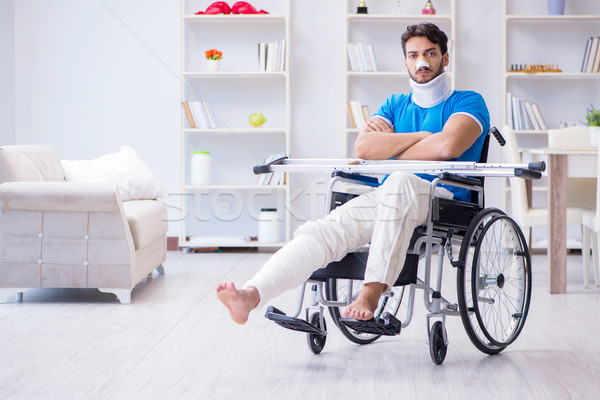Injured young man recovering at home Stock photo © Elnur