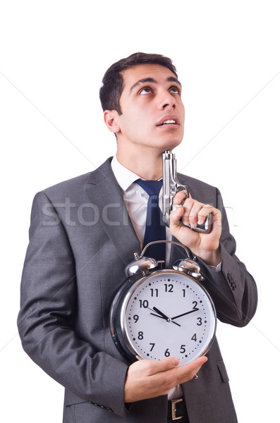 Stock photo: Man with gun and clock on white