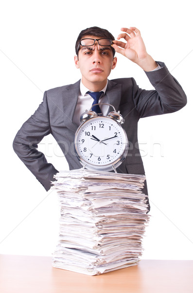 Femeie om de afaceri gigant ceas desteptator ceas muncă Imagine de stoc © Elnur