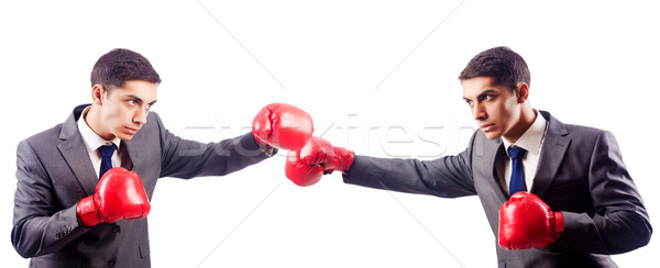 Businessman with boxing gloves on white Stock photo © Elnur