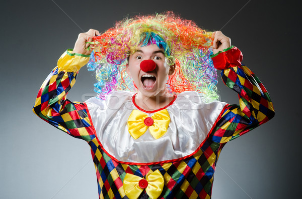 Funny clown in the studio Stock photo © Elnur