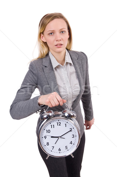 Businesswoman in gray suit holding alarm clock isolated on white Stock photo © Elnur