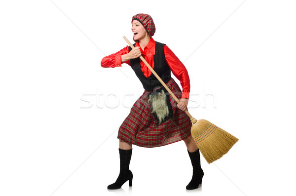 Funny woman in scottish clothing with broom Stock photo © Elnur