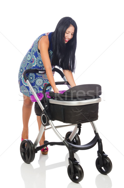 Happy mom with her baby in pram  Stock photo © Elnur