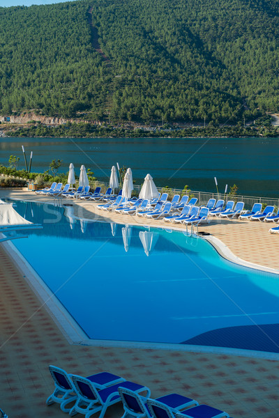 Nice swimming pool outdoors on bright summer day Stock photo © Elnur