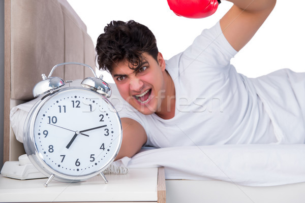 Man in bed suffering from insomnia Stock photo © Elnur
