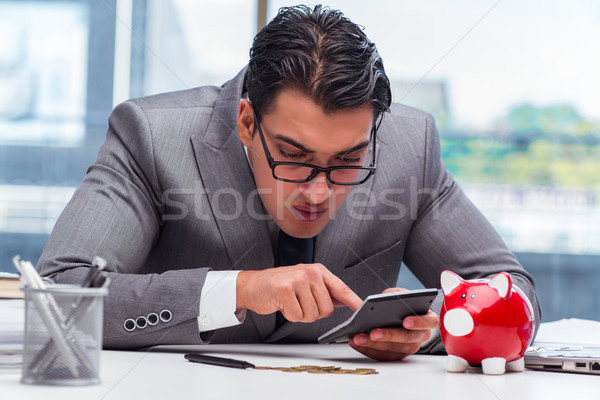 Bankrupt broke businessman with piggy bank Stock photo © Elnur