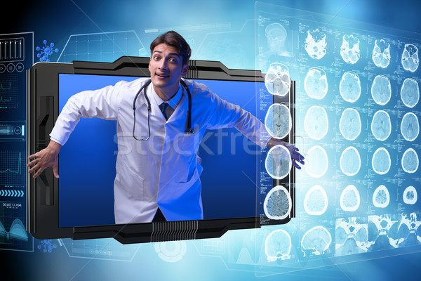 Telemedicine concept with doctor and smartphone Stock photo © Elnur