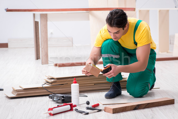 Stock foto: Auftragnehmer · arbeiten · Holzboden · Büro · Mann · Bau