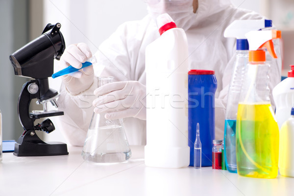 Chemist checking the quality of bathroom supplies Stock photo © Elnur