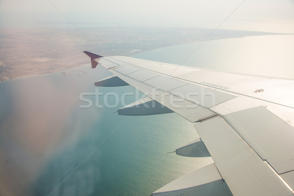 Avião asa fora janela tecnologia azul Foto stock © Elnur