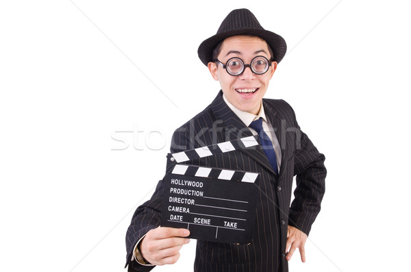 Stock photo: Funny man in elegant suit with movie clapboard isolated on white