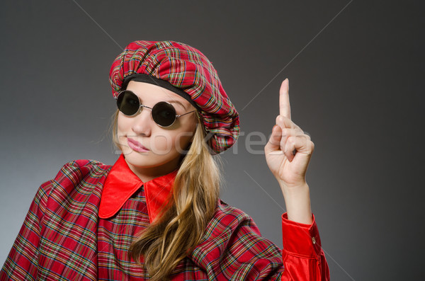 Woman wearing traditional scottish clothing Stock photo © Elnur