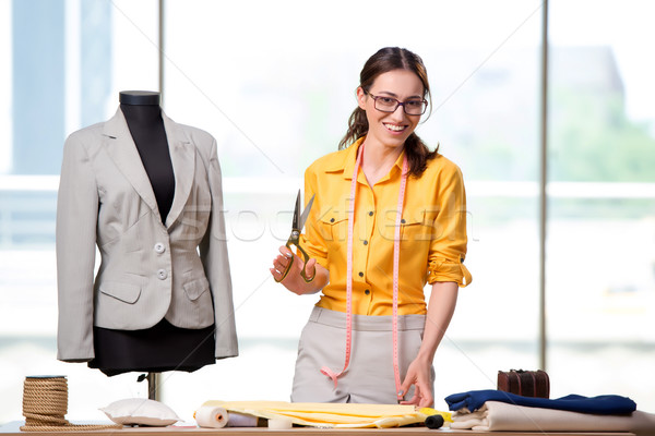 Mulher alfaiate trabalhando novo roupa moda Foto stock © Elnur