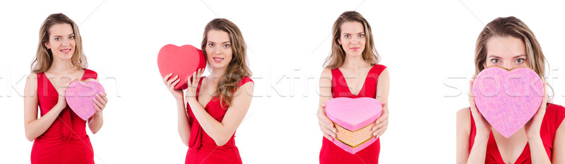Stock photo: Pretty girl holding gift box isolated on white
