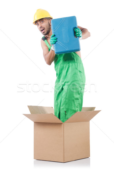 Man in coveralls with boxes Stock photo © Elnur
