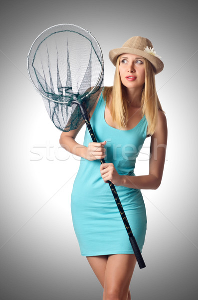 Attractive woman in butterfly catch Stock photo © Elnur