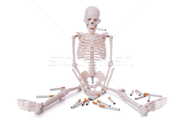 Antismoking concept with cigarettes and skull Stock photo © Elnur
