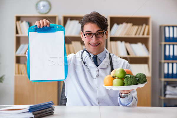 Scientist studying nutrition in various food Stock photo © Elnur