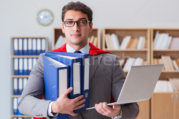 Stock photo: Superhero businessman working in the office