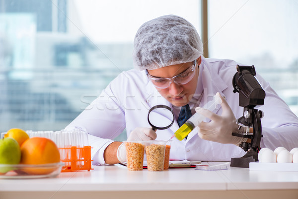 The nutrition expert testing food products in lab Stock photo © Elnur