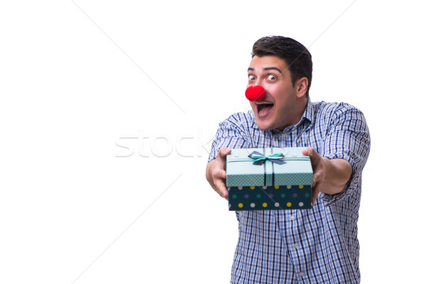 Man with a red nose funny holding a shopping bag gift present is Stock photo © Elnur