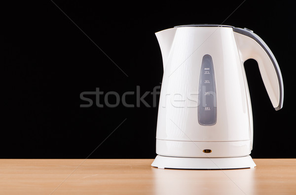 https://img3.stockfresh.com/files/e/elnur/m/16/4050046_stock-photo-white-kettle-against-grey-background.jpg