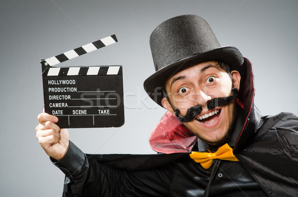 Funny man with movie clapboard Stock photo © Elnur