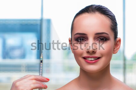 Beautiful woman during make-up cosmetics session Stock photo © Elnur