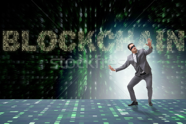 Businessman in blockchain cryptocurrency concept Stock photo © Elnur