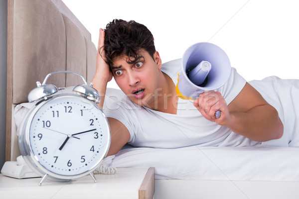 Homme lit souffrance insomnie horloge orateur [[stock_photo]] © Elnur