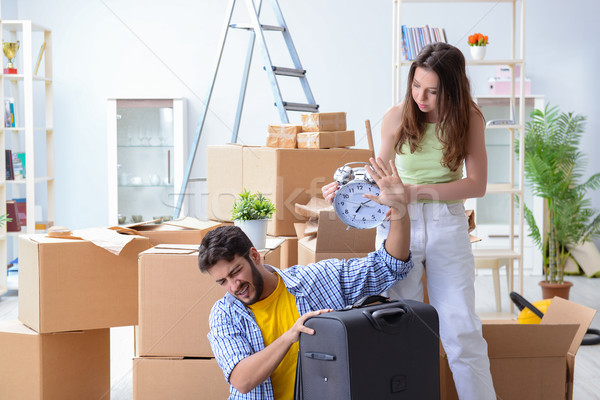 Young family unpacking at new house with boxes Stock photo © Elnur
