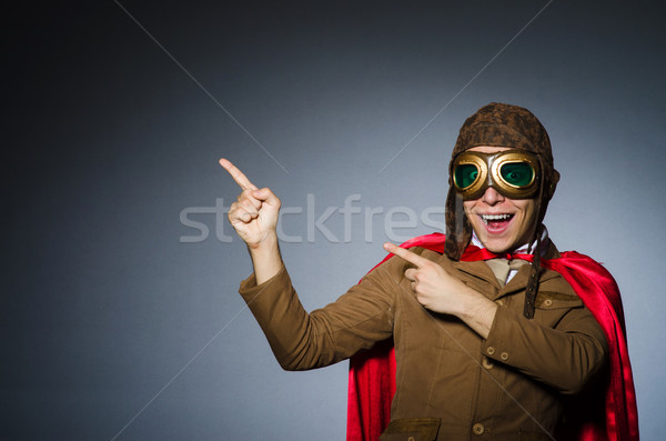 Funny pilot with goggles and helmet Stock photo © Elnur