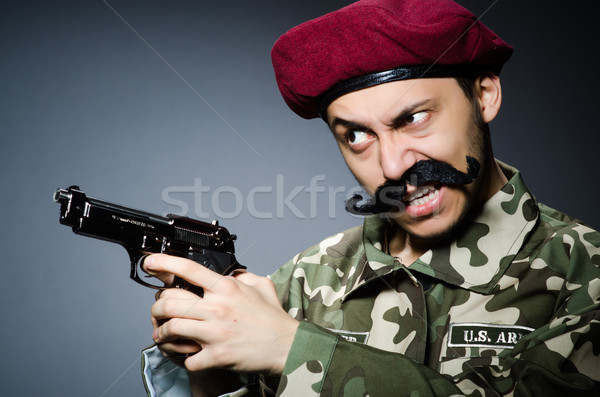 Vicces katona sötét háttér biztonság fegyver Stock fotó © Elnur