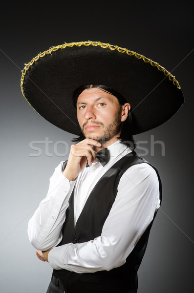 Mexican man wears sombrero isolated on white Stock photo © Elnur
