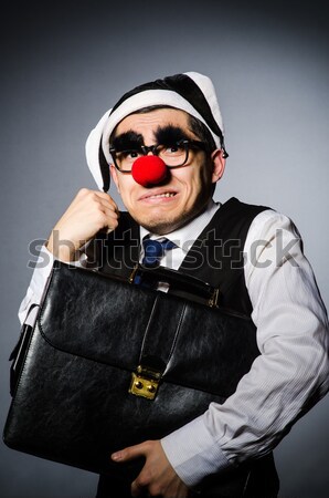 Young prisoner in chains against gray Stock photo © Elnur