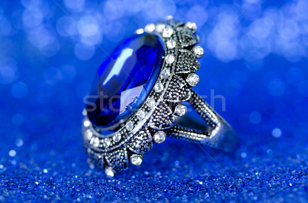 Jewellery ring against blue background Stock photo © Elnur