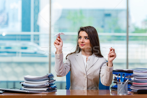 Businesswoman sitting at the office desk Stock photo © Elnur