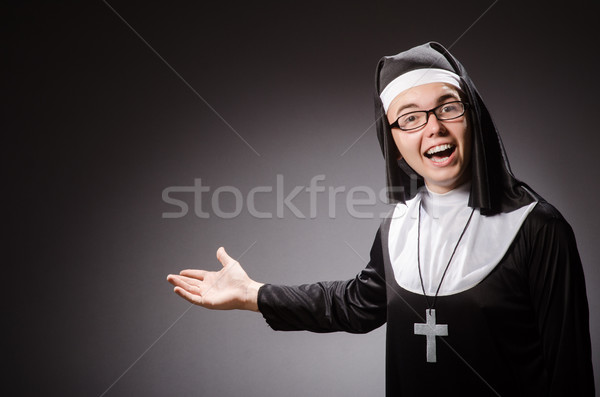 Funny Mann tragen Nonne Kleidung Kreuz Stock foto © Elnur