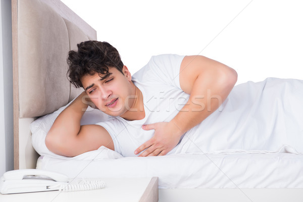 Férfi ágy szenvedés álmatlanság szomorú alszik Stock fotó © Elnur