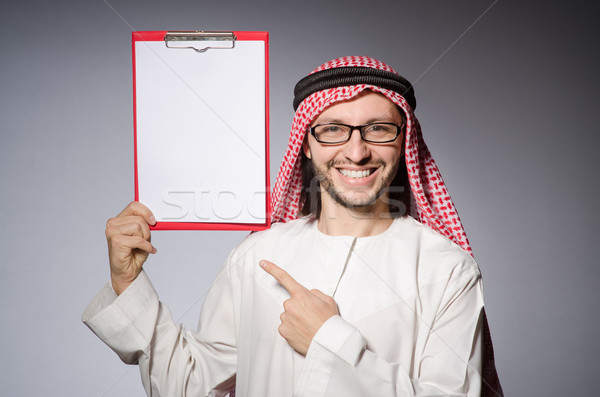 Arab man with paper binder Stock photo © Elnur