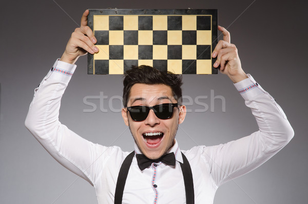 Funny chess player with board Stock photo © Elnur