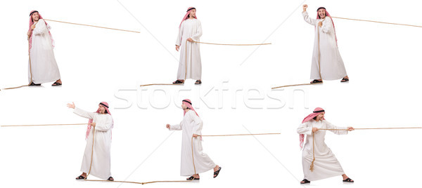 Arab in tug of war concept on white Stock photo © Elnur