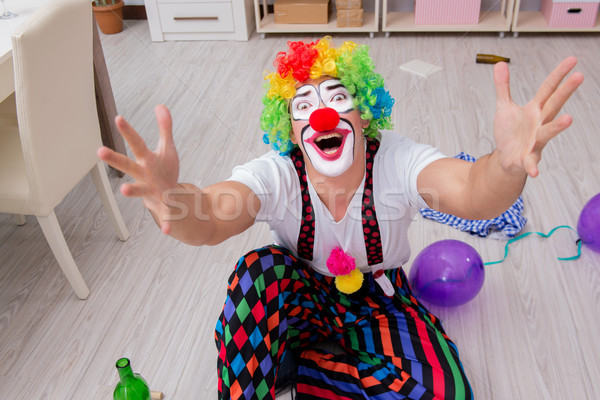 Drunk clown celebrating having a party at home Stock photo © Elnur