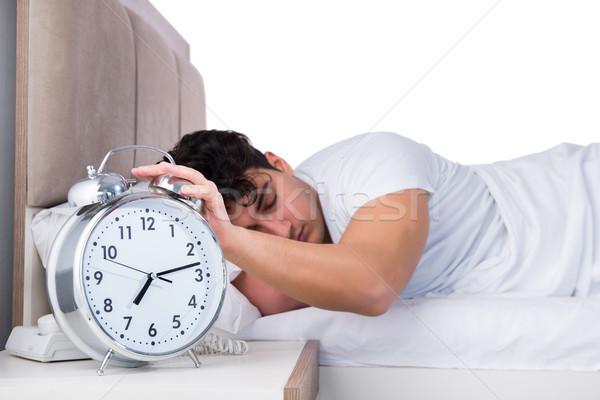 Mann Bett Leiden Schlaflosigkeit Uhr krank Stock foto © Elnur