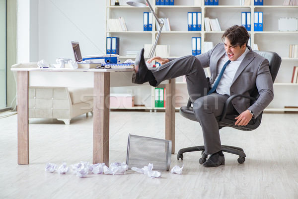 Angry businessman shocked working in the office fired sacked Stock photo © Elnur